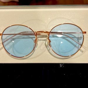 Tommy Hilfiger blue glasses. Very special.